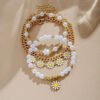 D_806094-MCO84402465867_052025-O.jpg Conjunto De Pulseras Con Colgante De Margarita Joyas Blanco